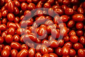 Red fresh tomatoes background. Natural local products on the farm market.