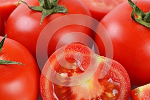 The red fresh tomatoes cut. Macro
