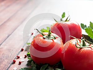 Red Fresh Tomatoes Parsley Pepper on wooden background Copy space Selective focus