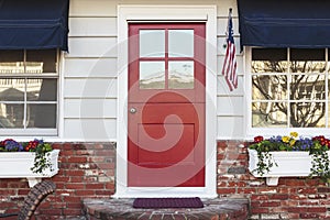 Red front door of an american home