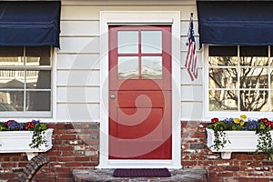 Red front door of an american home