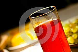 Red fruit drink in glass