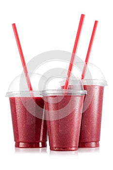 Red fruit smoothie in three size of pet cup