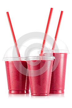 Red fruit smoothie in three size of pet cup