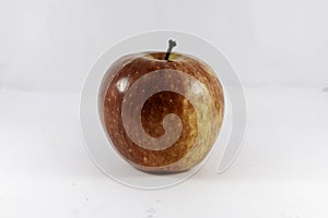 Red fuji apple isolated on white studio background