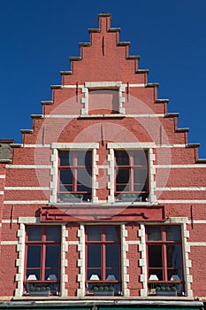 Red gable roof of the historic house