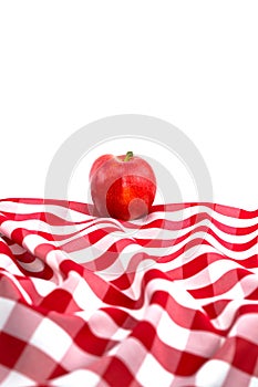 Red Gala Apple on Checkered Tablecloth