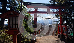 A red gate at the Chureito Pagoda with the Mt Fuji in the background
