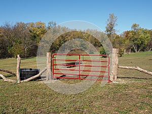 Red gate by fenced in area