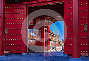 Red Gates and Traditional Chinese Buildings in the Forbidden City photo