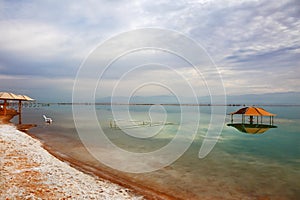 The red gazebo in the water
