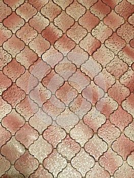 Red geometric parttern of a floor