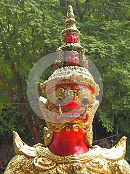 Red Giant Statue in temple Thammunee khao Fha