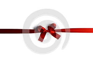 Red gift bow on white