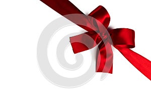 Red gift bow on white