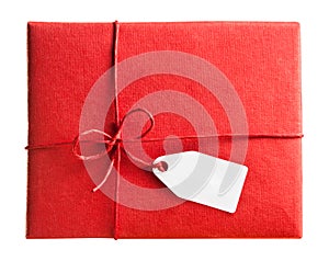 Red gift box with blank gift tag