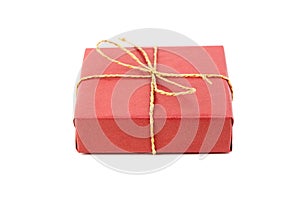 Red gift box with bow isolated on white. Wrapped Christmas or birthday gift box. Single holiday present