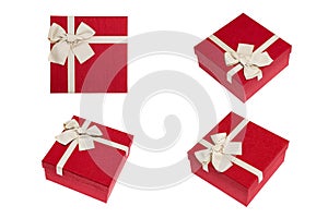 Red gift box with gold ribbon and bow isolated on white background
