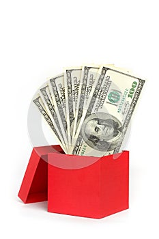 Red gift box with money isolated on white