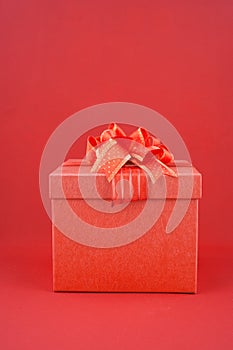 Red Gift box on red backgroud for Happy New Year