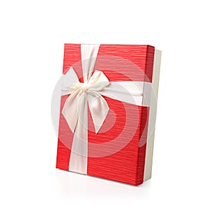 Red gift box with white ribbon bow isolated on white background