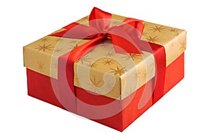 Red gift or present box with golden colored top and red ribbon bow isolated on white background