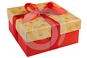 Red gift or present box with golden colored top and red ribbon bow isolated on white background