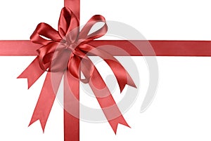 Red gift ribbon bow or rosette isolated on white background