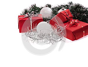 Red gifts with silver tinsel and white balls