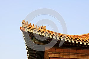 Red glazed tile eaves and wall