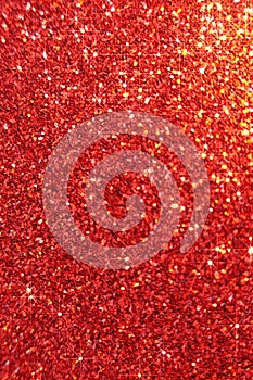Red glitter background.Wallpaper phone shining glitter. shining red surface.New Year and Christmas background. glitter