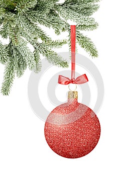 Red Glitter Christmas decor ball with bow on ribbon on snow tree