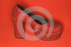 Red glitter high heel shoe.