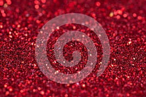 Red glitter texture background. Red bokeh of light textured glitter background