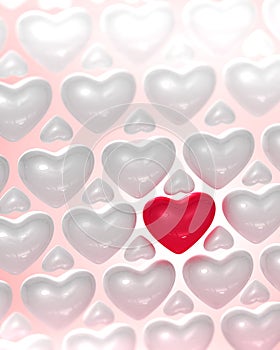 Red glossy heart surrounded by bright hearts