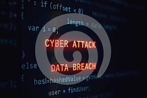 Red glowing text C Y B E R A T A C K and D A T A B R E A C H on dark computer code screen cybersecurity 1