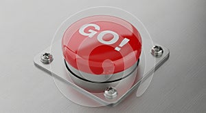Red ' GO!' Button Mounted on a Brushed Metal Surface go button start button