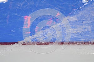 Red goal line on ice hockey rink. Winter sport