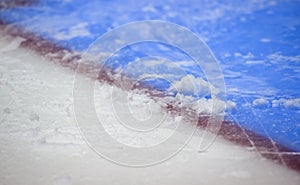 Red goal line on ice hockey rink. Winter sport