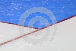 Red goal line on ice hockey rink. Winter sport