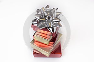 Red and Gold boxes with a Silver Bow on an Isolated background