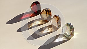 Red, Gold, Bronze and White Glass Hearts Isolated on a White Background