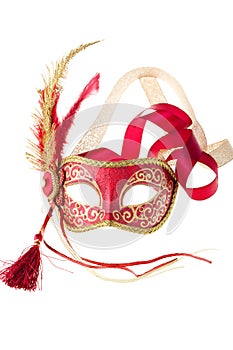 Red and gold feathered carnival mask