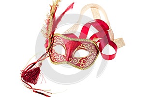 Red and gold feathered carnival mask