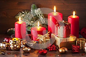 Red and golden christmas gift box and decoration lantern candle