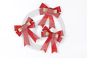 Red and golden Ribbon Bow isolated on White Background