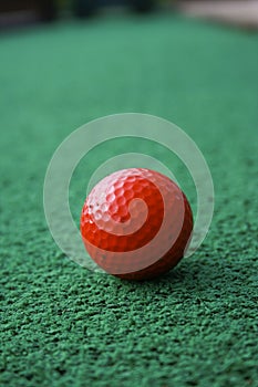 Red Golfball on the Green