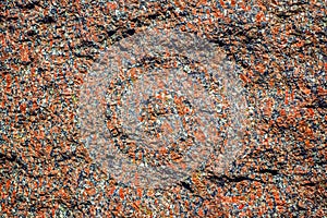 Red granite stone texture.