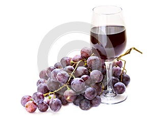 Red grape with glass of wine