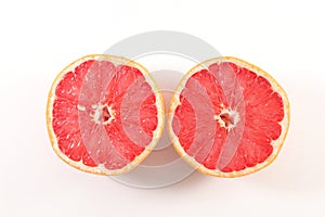 Red graperfuit half isolated on white